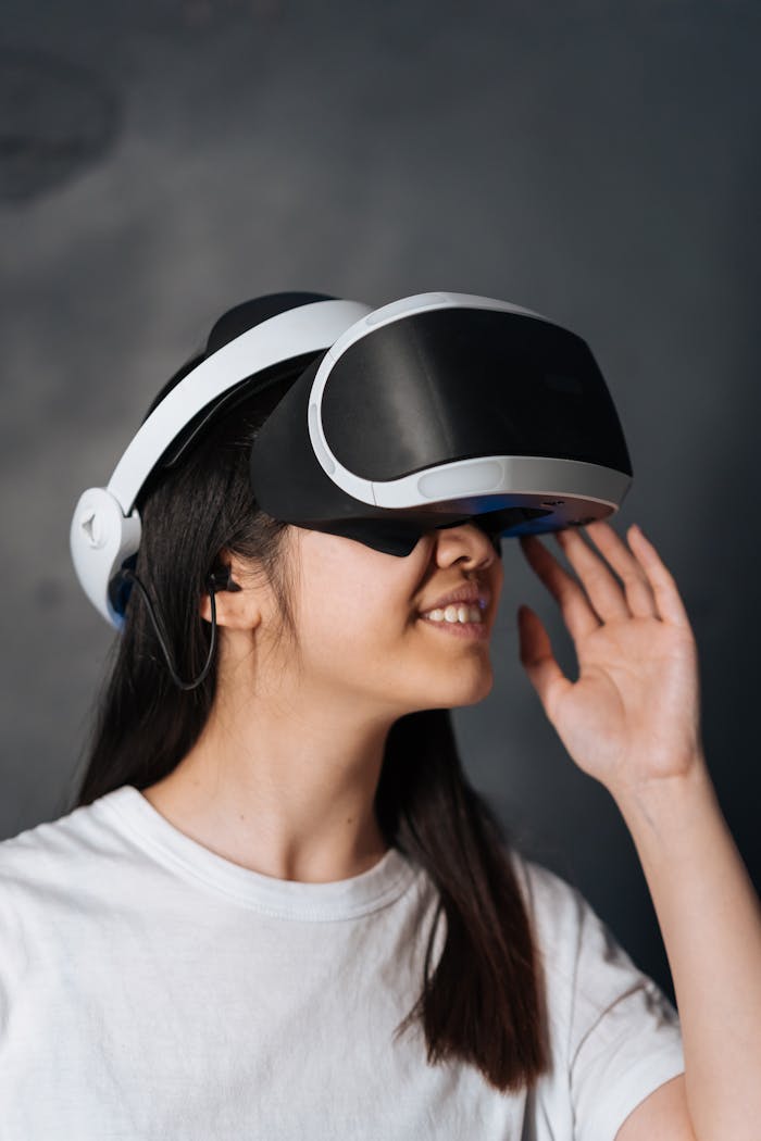 hero-img Close-up of a young woman immersed in virtual reality using VR goggles.